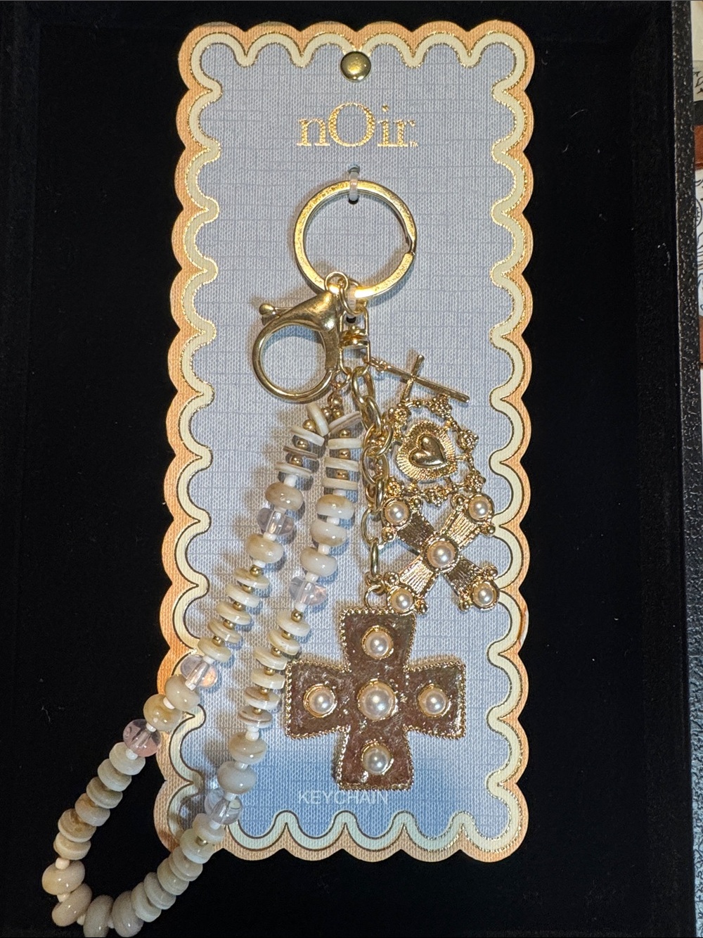 nOir Jewelry Gold and Cream Beaded Keychain with Cross and Charms